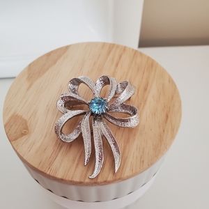 Stanley Home Products Vintage bow brooch with blue stone granny core rom…